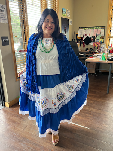 Hispanic Heritage Month dancer showing her traditional costume
