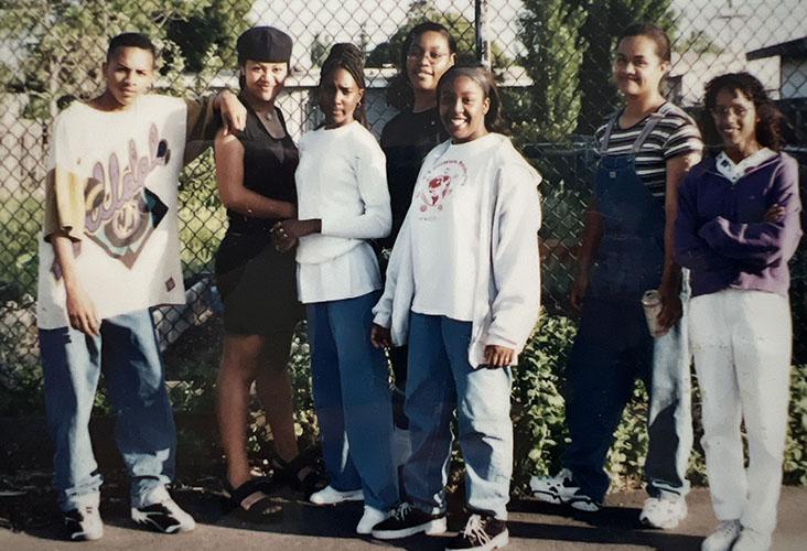 Seven middle schoolers posing