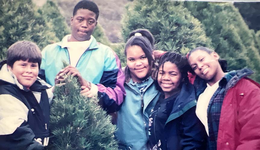 Five middle schoolers choosing a Christmas tree